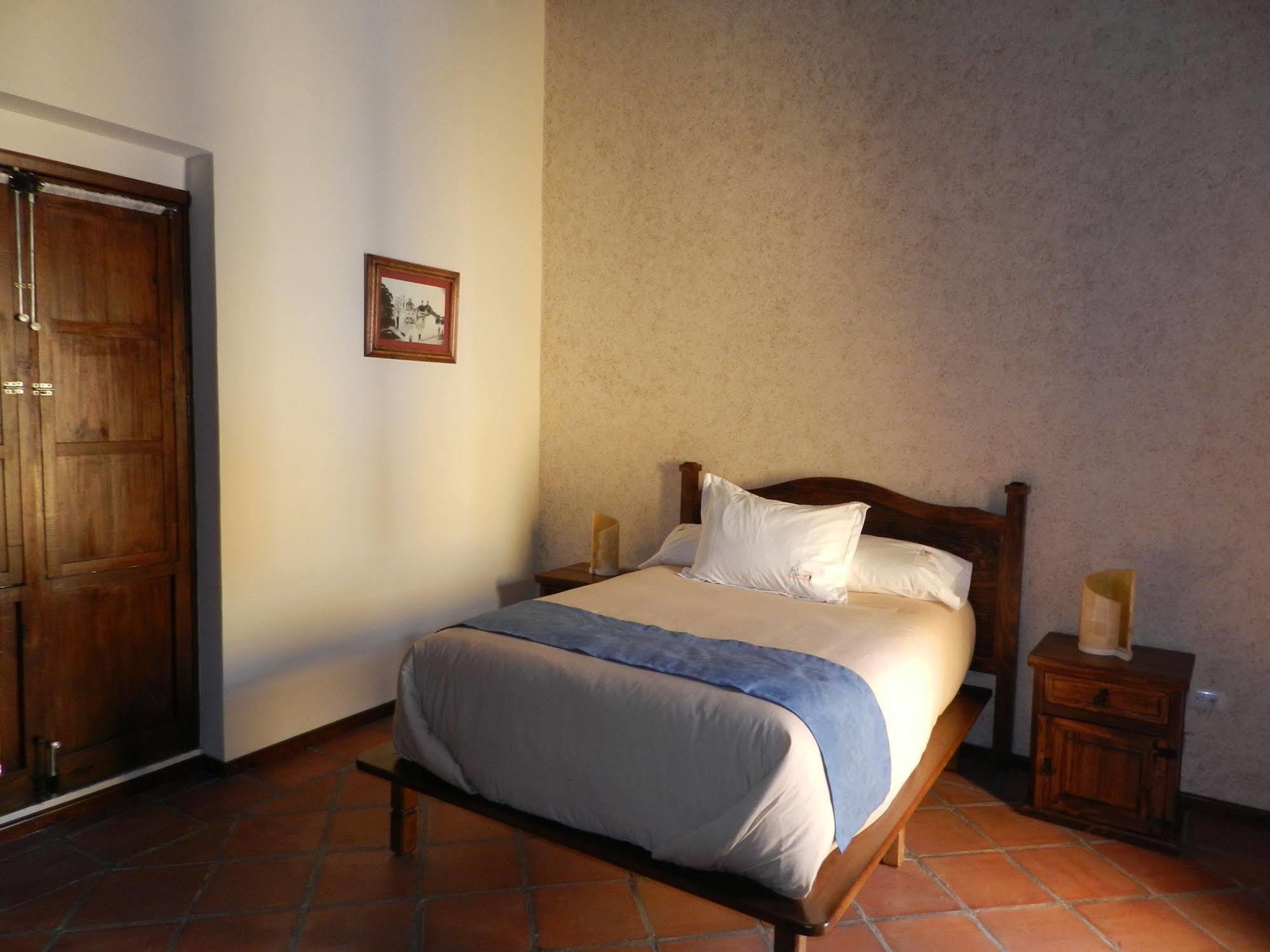 Collection O Al Otro Lado Del Rio, Puebla Hotel Exterior photo A room at the hotel